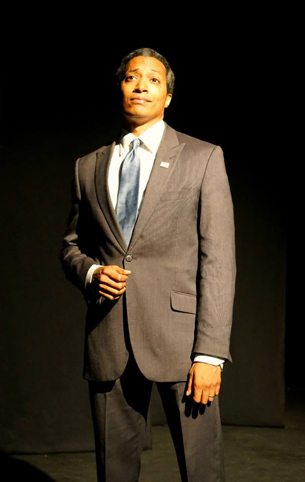 President Obama (KJ Middlebrooks) addresses the nation.