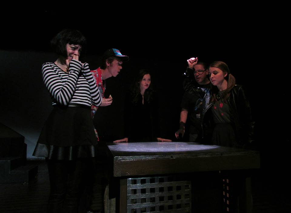 Debbie rolls the dice while playing "Dark Dungeons" with her friends - including the soon-to-die Marcie. (L-R: Angela Sauer, Nathan Wellman, Rebecca Larsen, Erik Engman & Julia Griswold)