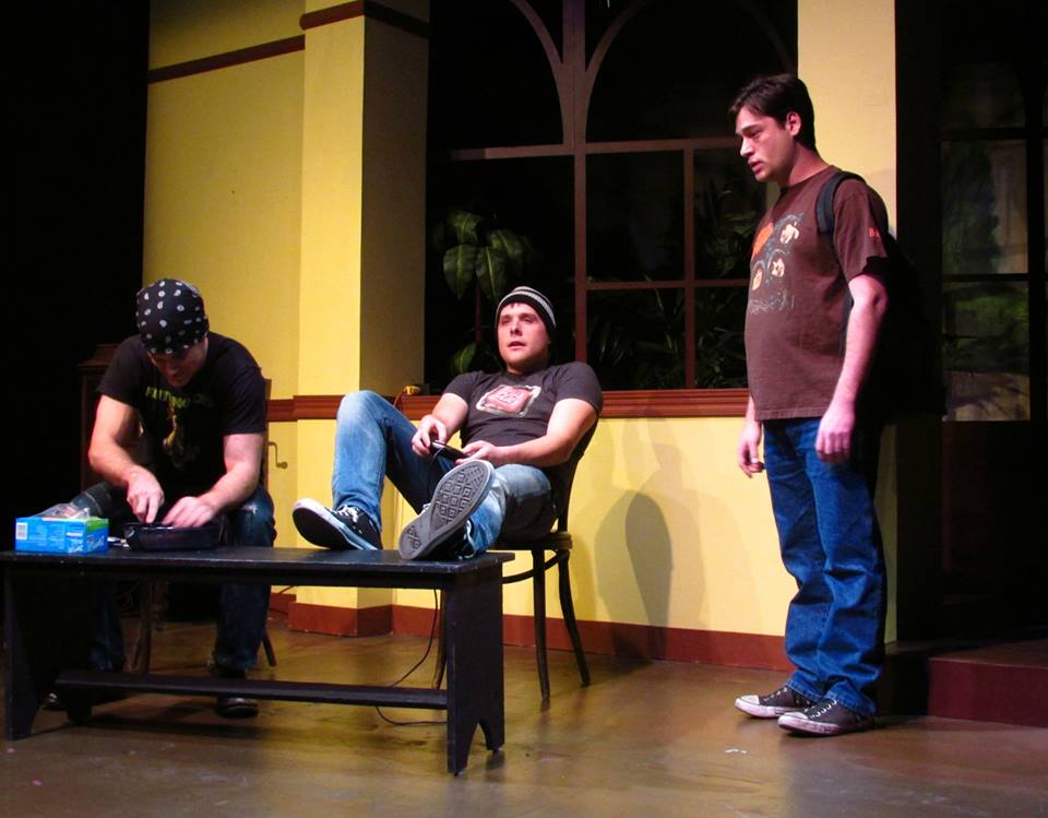 Williams (Will McMichael) and Tyler (Colin Willkie) are listening/not listening as Jason (Ari Radousky) goes on about his personal problems and also Jackson Browne.
