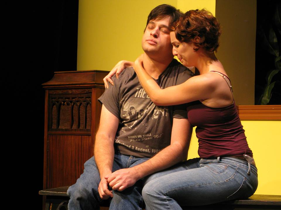 Kassy, moved by a no-strings offer of help, holds Jason tight.