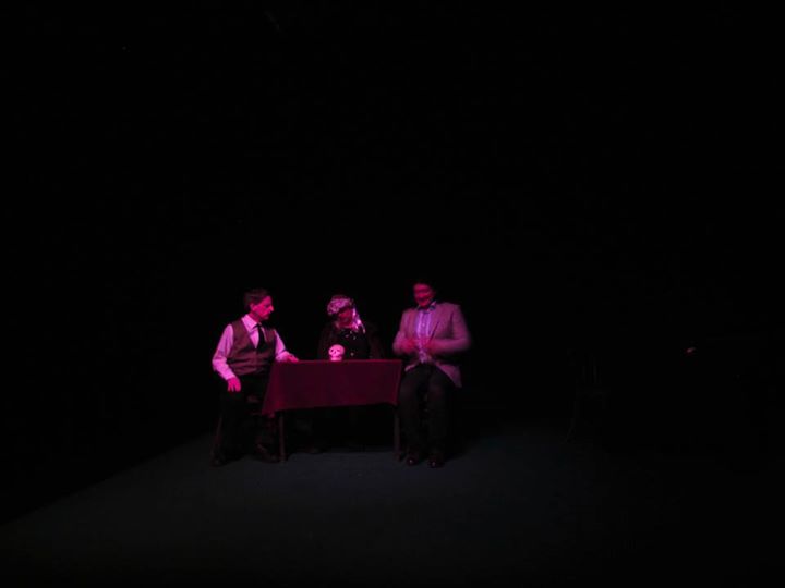 Mr. Carstairs (Corey Klemow), Madame Robocaller (John Wuchte) and Cadwaller (Scot Shamblin) at a sham of a séance.