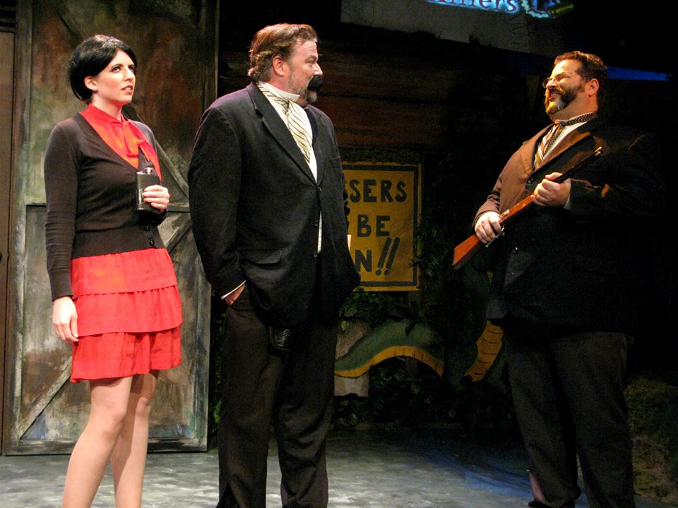 Hepburn and Booth try to enlist the help of Teddy Roosevelt (Chairman Barnes).