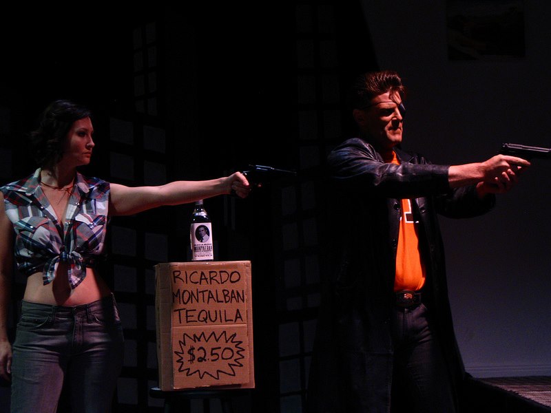 Money (Rebecca Larsen) and Run both decide to hold up the liquor store at the same time.