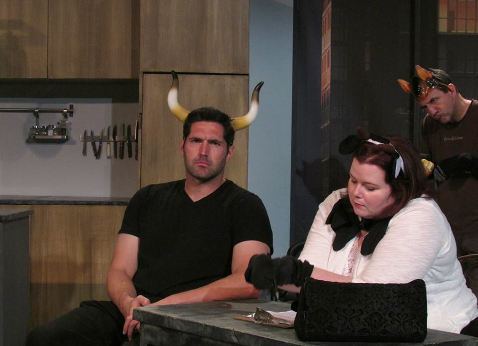 Max (Matt Merchant) makes out his will as Belinda (Alyssa Preston) transcribes and Richard (Bart Tangredi) looks on.