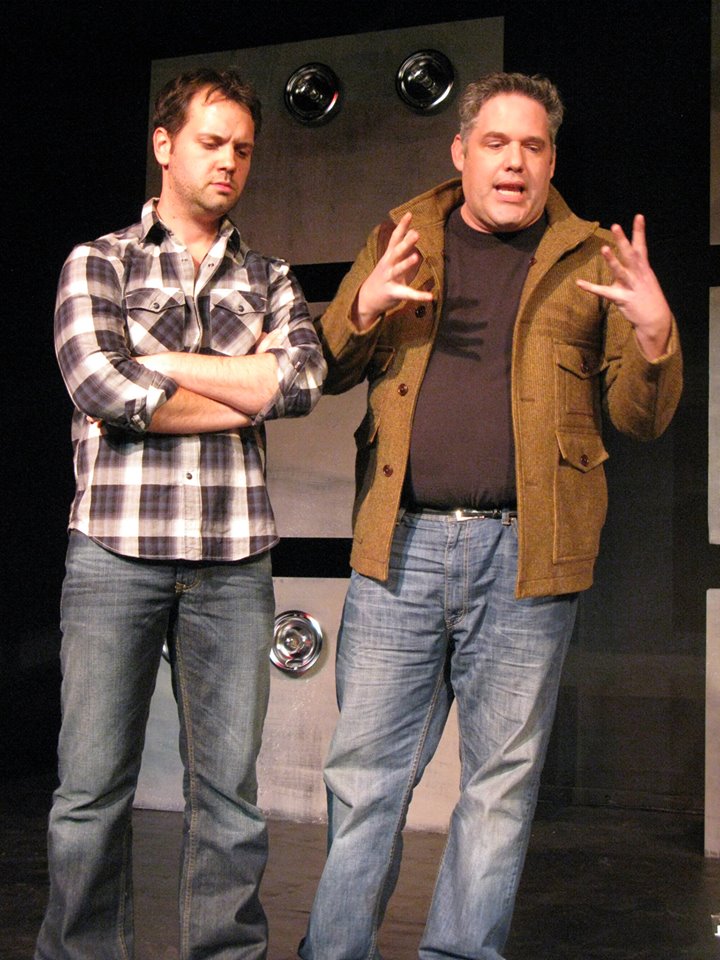 Joe (Bryan Bellomo) listens sceptically to Karl (Peter Fluet).