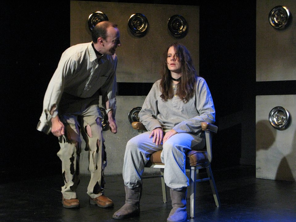 Prescott (Michael Lanahan) tries to get through to Maude (Erin Parks), but her soul's no longer in her body.