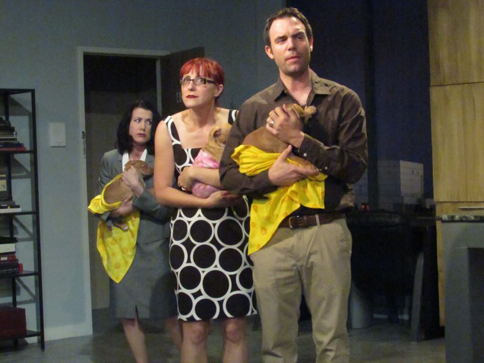 Perkins (Lisa Anne Nicolai) and Wanda (Mandi Moss) look on as Winslow (Michael Holmes) reluctantly lays down the law.