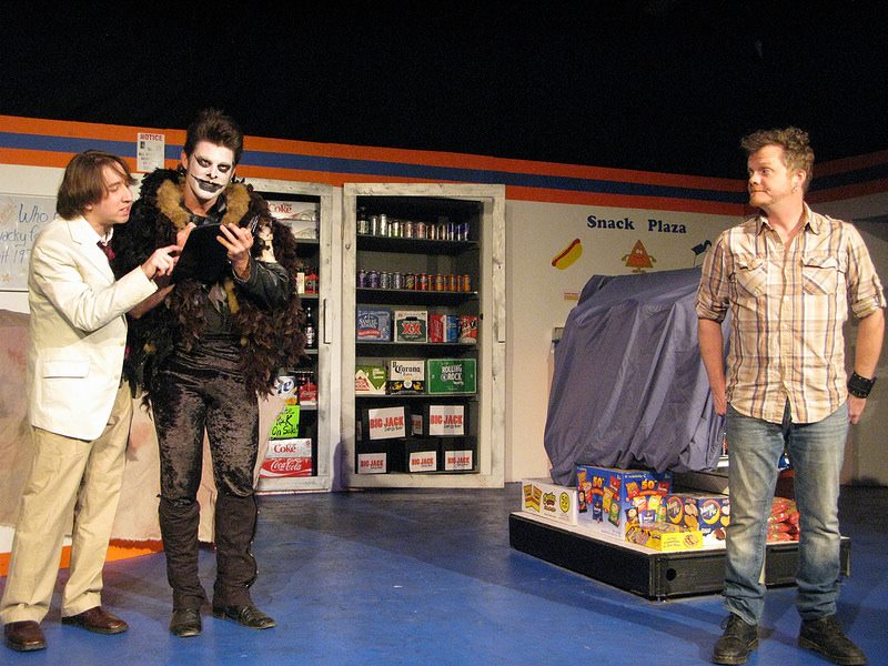 Michael Moon and Samil prepare to kill Tom Hanks (Justin Welborn) - not that Tom Hanks, just some guy named Tom Hanks.