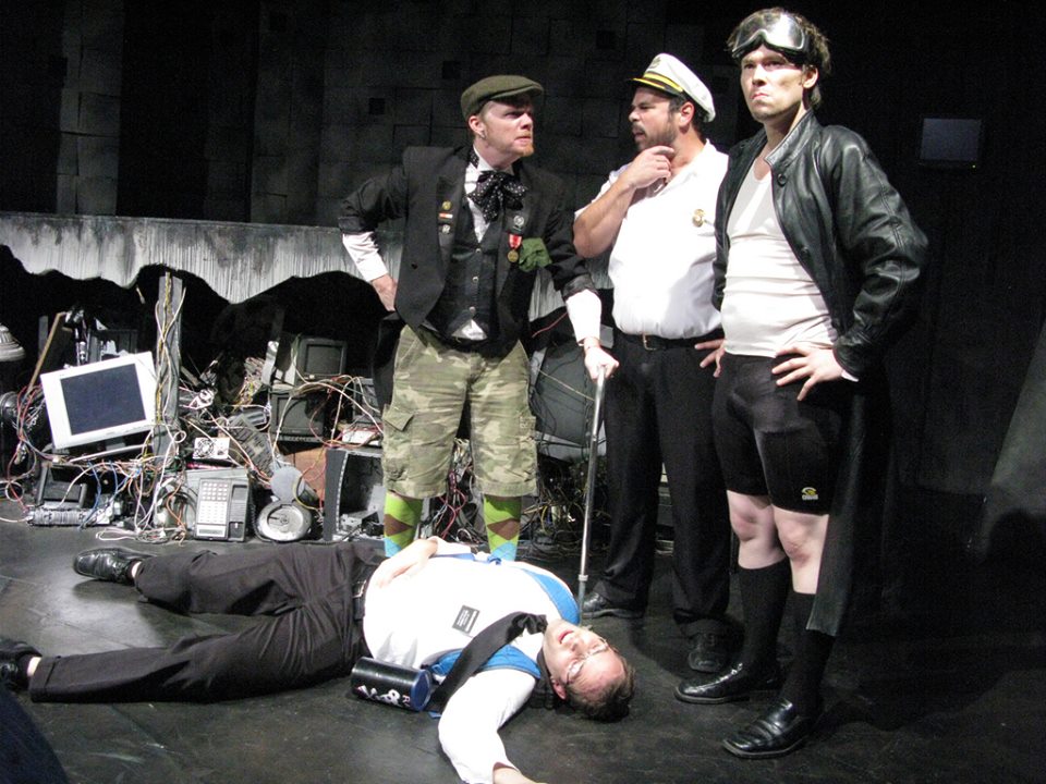 The gang investigate the death of a Mormon guy. (L-R: Travis Goodman as "Enoch," Justin Welborn as "Watts," Michael Dunn as "LeStrade" and Eamon Glennon as "Holmes")