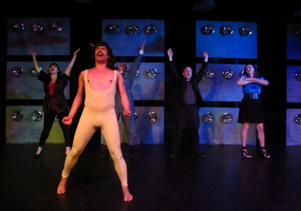 The mean people at work summon Freddie Mercury for a preview of how they're going to win the contest.  (L-R: Natalie Rose, Esteban Andres Cruz, Aaron Mendelson, Corey Klemow & Rebecca Larsen)