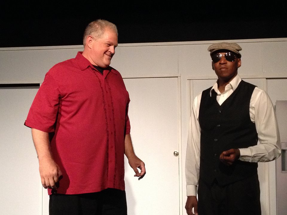 Mel Phistopholes (Abraham Benrubi) informs Lemon that the Big Man downstairs has declared the match a draw, and he must now face Mel in musical combat.