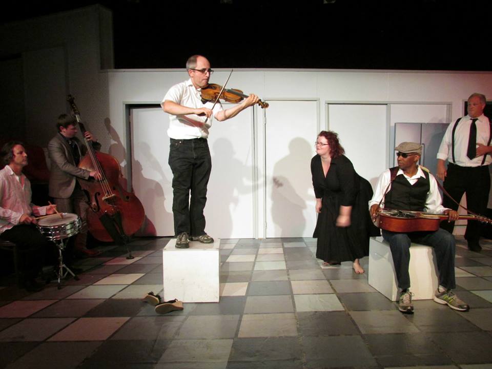 Playin' a fiddle and plain' it hot.