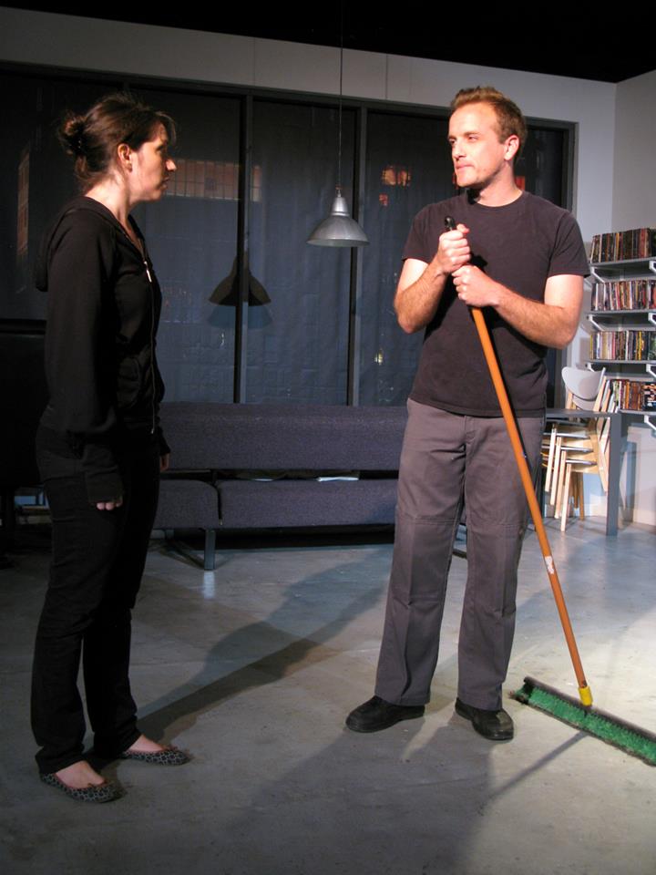 Caroline (Carrie Keranen) meets the janitor (Pete Caslavka).