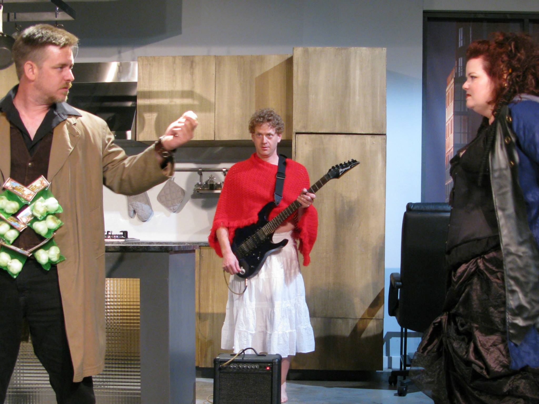Van Helsing (Joshua Benton) confronts Captain Cruella (Alyssa Preston) while Edwina (Ed Goodman) looks on.
